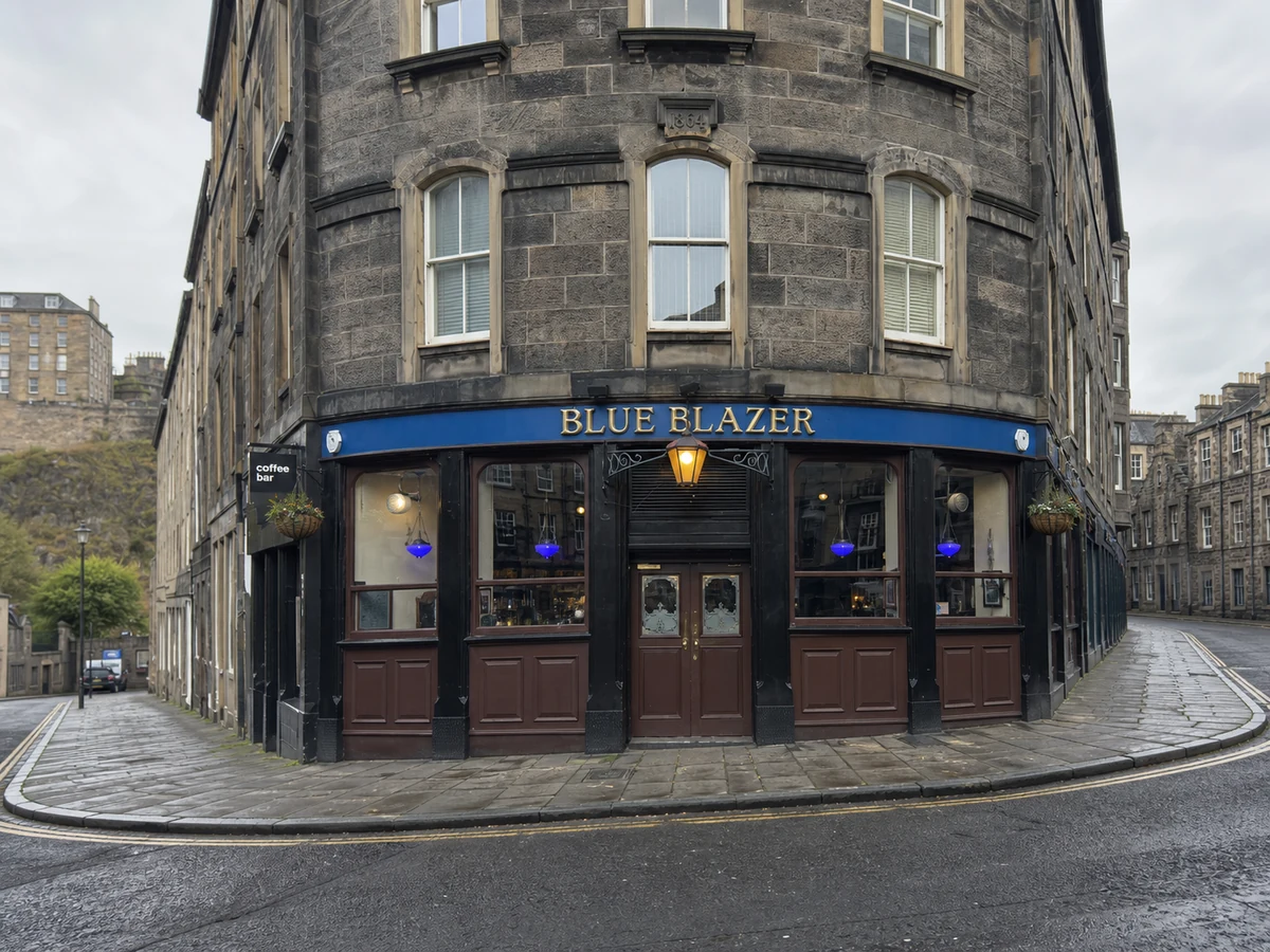 The Blue Blazer’s bowed Spittal Street corner frontage with blue fascia, central lantern and brown glazed bays.