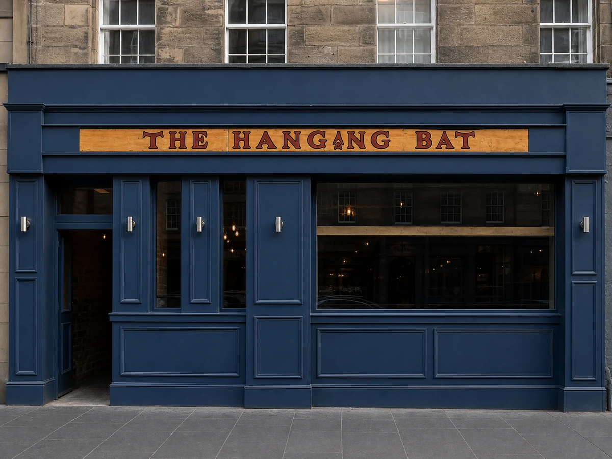 The Hanging Bat’s navy Lothian Road frontage with its long timber nameboard.