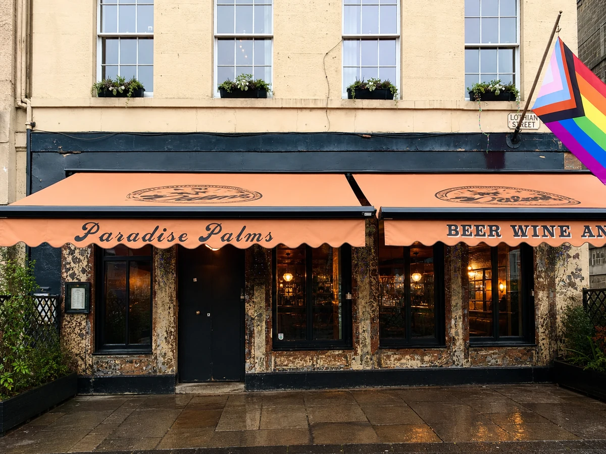 Paradise Palms’ real-source-led Lothian Street frontage, with its named peach awning, weathered finish and Pride flag.