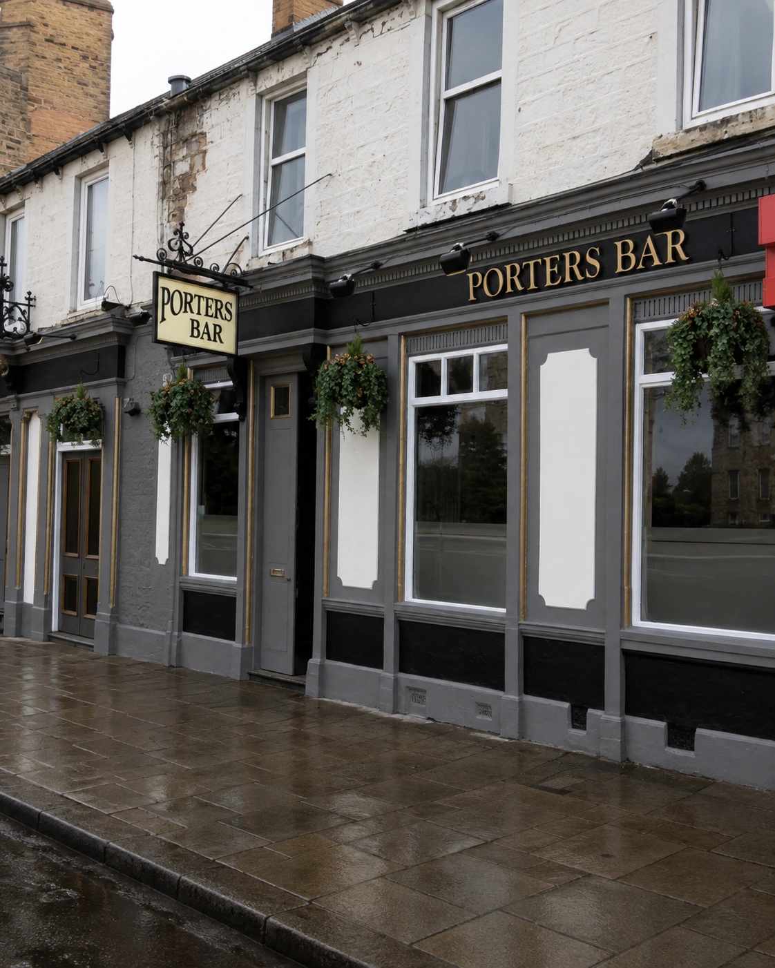 Porters Bar’s documented grey frontage with gold lettering, white panels and a projecting sign.