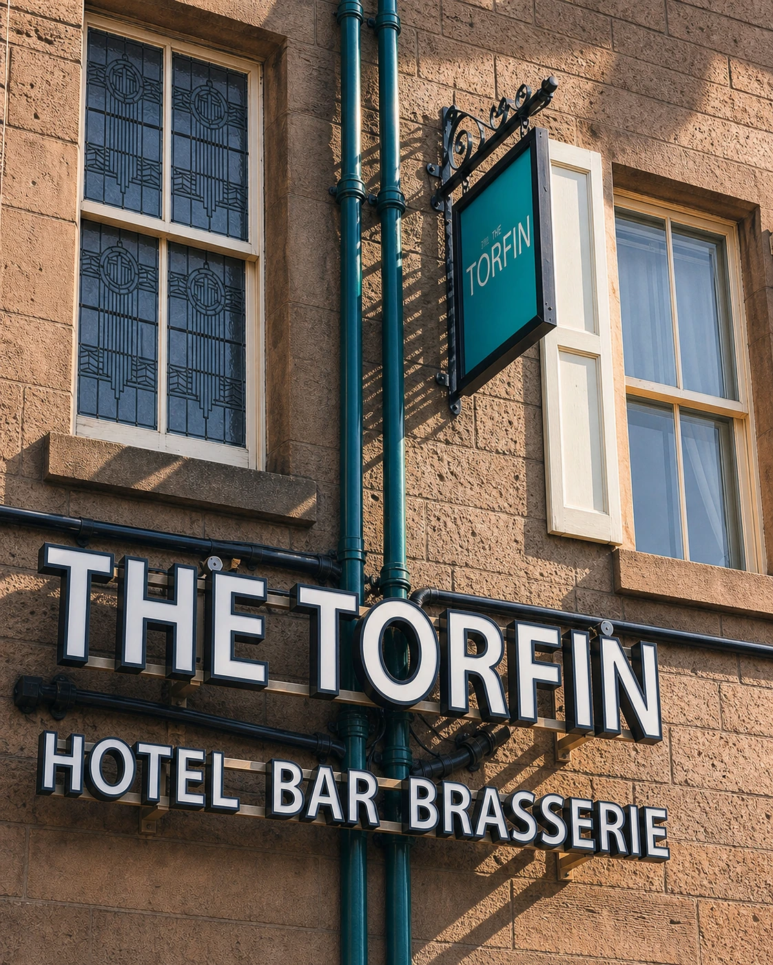 Illustrated portrait of The Torfin's approved principal frontage and signage.
